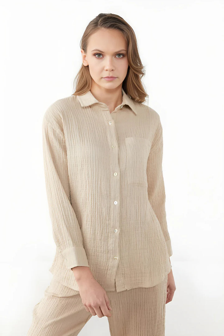 Model wearing Lilia Long Sleeve Top – relaxed cotton long sleeve top in soft natural fabric by Vespera  The Label.