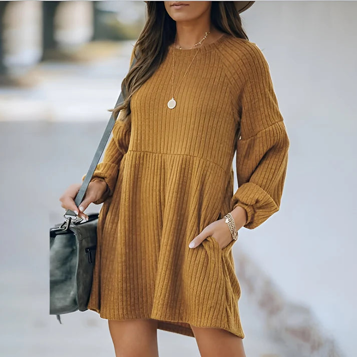 Model wearing Aurora Long Sleeve Mini Dress – cozy knit casual mini for autumn/winter by Vespera The Label.