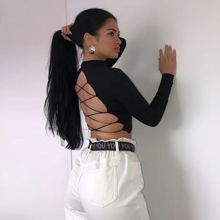 Model wearing Ava Top – cropped streetwear fashion top for women with breathable fabric and slight stretch, from Vespera The Label.
