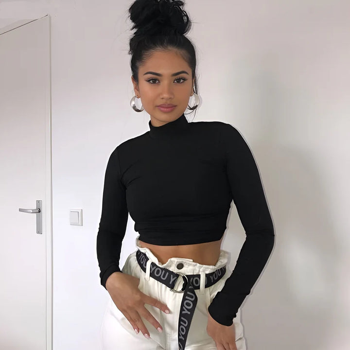 Model wearing Ava Top – cropped streetwear fashion top for women with breathable fabric and slight stretch, from Vespera The Label.