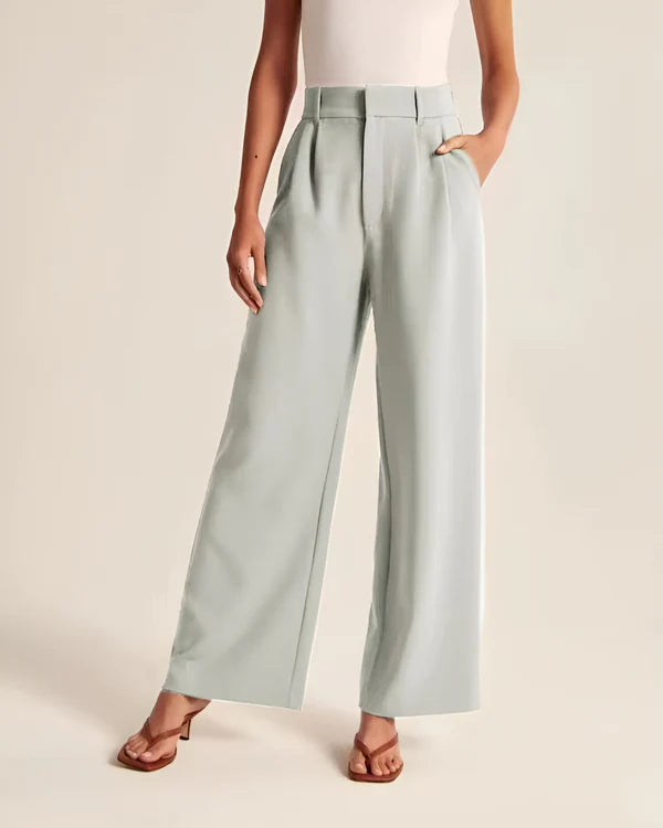 Model wearing Macmillan Pants – casual relaxed-fit trousers for women in minimal design, by Vespera  The Label