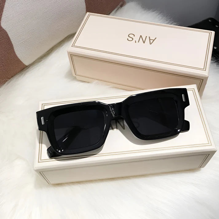 Model wearing Lexie Rectangular Sunglasses – bold cat-eye inspired UV400 fashion sunglasses with plastic frame and acrylic lenses by Vespera  The Label