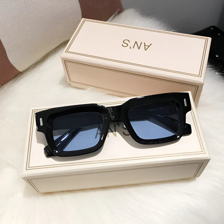 Model wearing Lexie Rectangular Sunglasses – bold cat-eye inspired UV400 fashion sunglasses with plastic frame and acrylic lenses by Vespera The Label