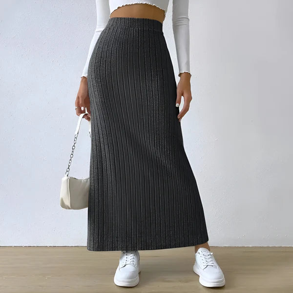 Model wearing Lewis Skirt – straight mid-calf solid skirt, styled for professional wear, by Vespera The Label