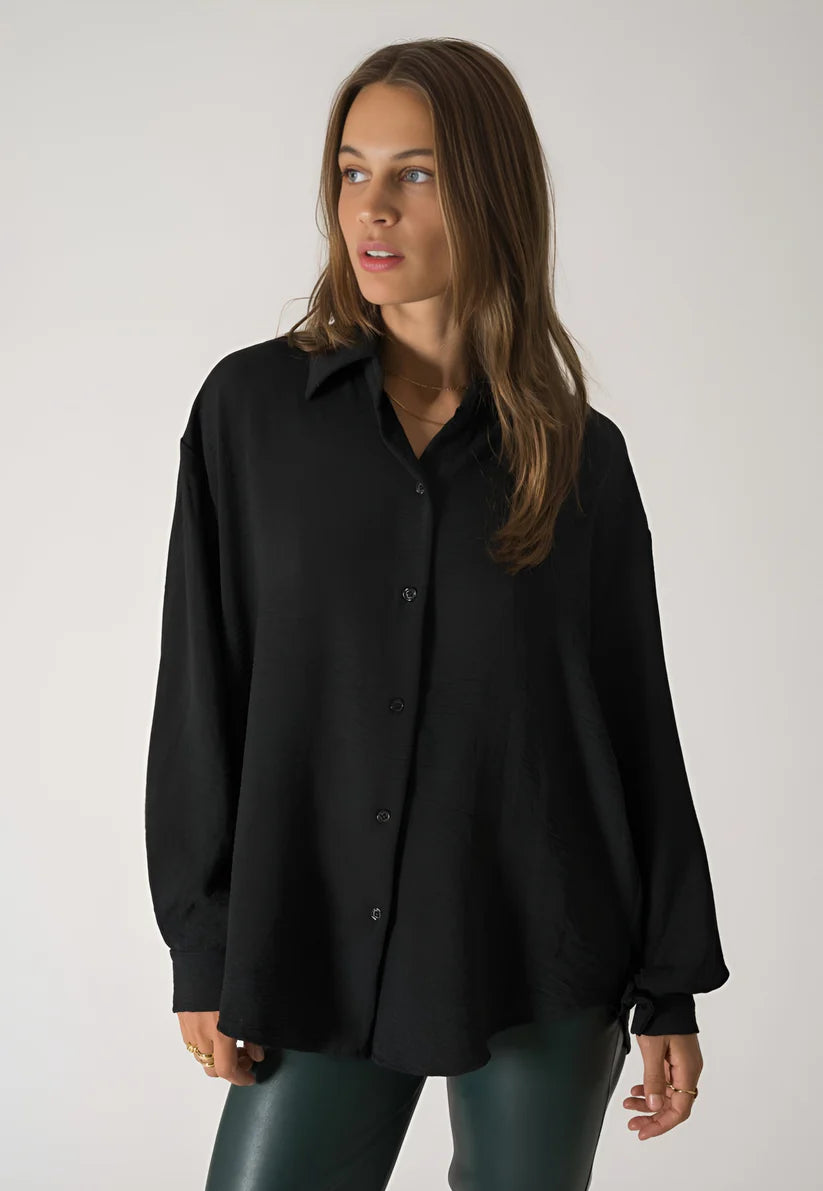 Model wearing Lilia Long Sleeve Top – relaxed cotton long sleeve top in soft natural fabric by Vespera  The Label.