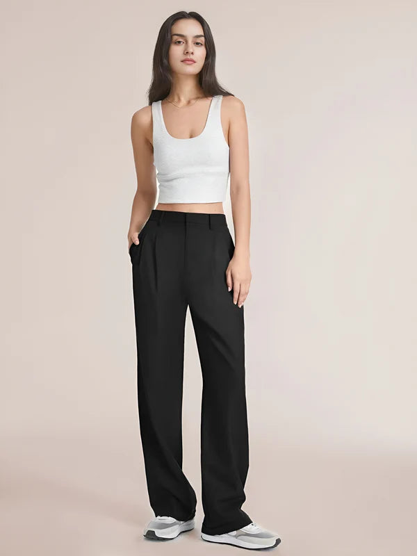 Model wearing Macmillan Pants – casual relaxed-fit trousers for women in minimal design, by Vespera The Label