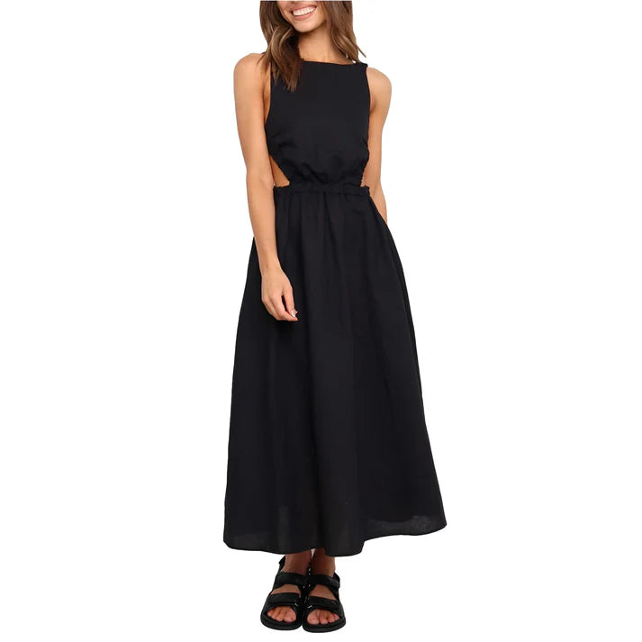Model wearing Nellie Maxi Dress – relaxed empire waist summer maxi dress with a loose silhouette by Vespera The Label.