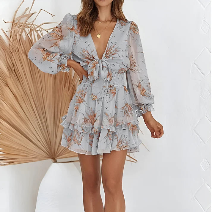 Model wearing Maricon Mini Dress – printed A-line beach dress with high stretch and natural waist by Vespera The Label.