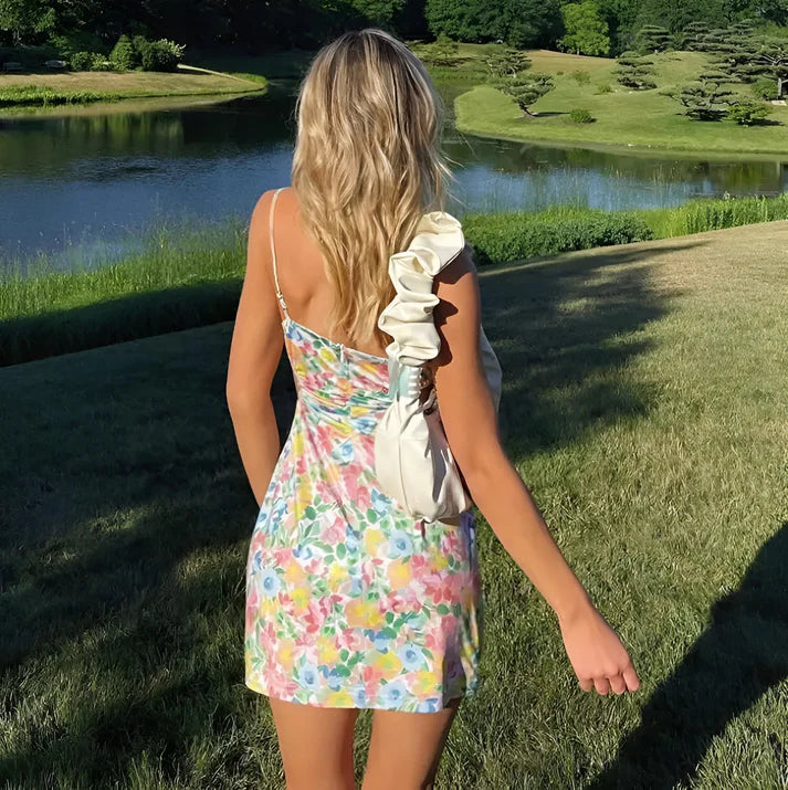 Model wearing Breeala Mini Dress – romantic floral A-line mini dress for summer by Vespera The Label.