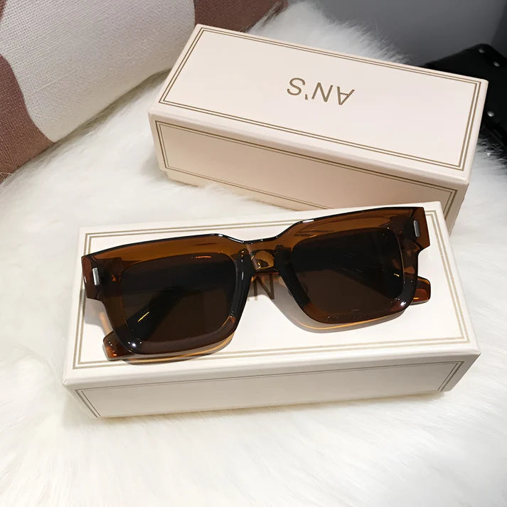 Model wearing Lexie Rectangular Sunglasses – bold cat-eye inspired UV400 fashion sunglasses with plastic frame and acrylic lenses by Vespera The Label