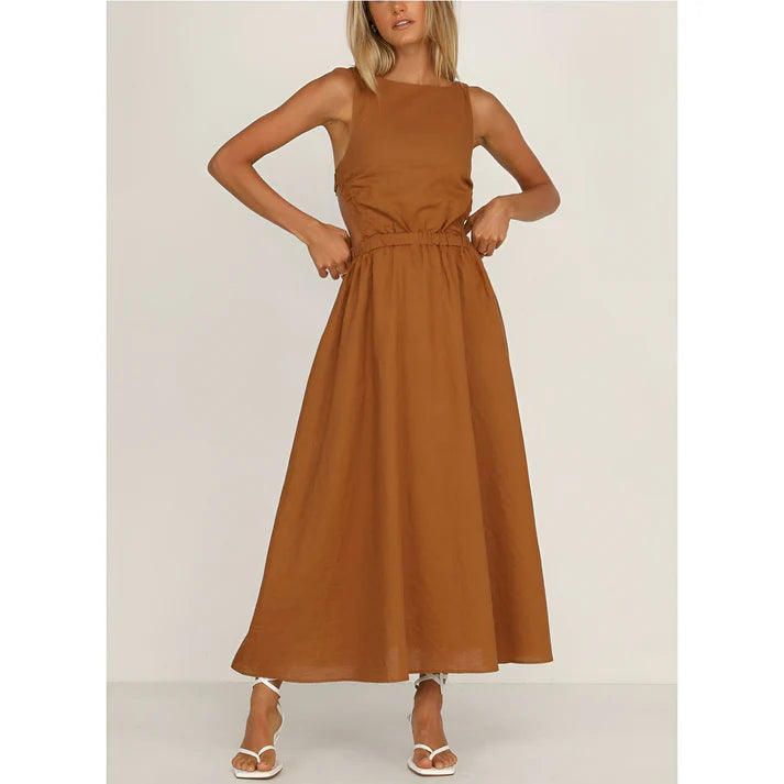 Model wearing Nellie Maxi Dress – relaxed empire waist summer maxi dress with a loose silhouette by Vespera The Label.