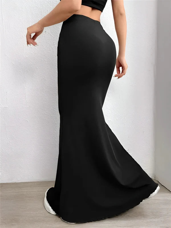 Model wearing Candyce Skirt – floor-length solid mermaid silhouette styled for formal occasions, by Vespera  The Label