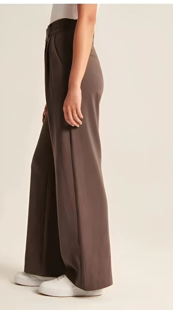 Model wearing Macmillan Pants – casual relaxed-fit trousers for women in minimal design, by Vespera The Label
