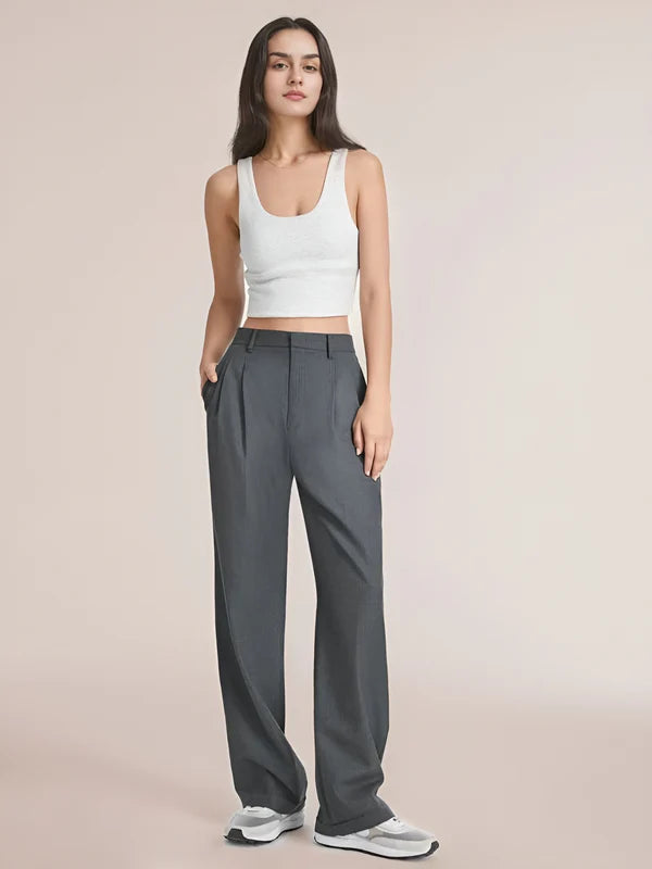 Model wearing Macmillan Pants – casual relaxed-fit trousers for women in minimal design, by Vespera  The Label