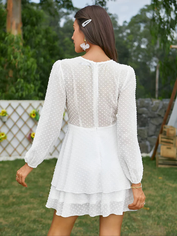 Model wearing Elliana Mini Dress – elegant slim fit chiffon mini dress for summer by Vespera The Label.