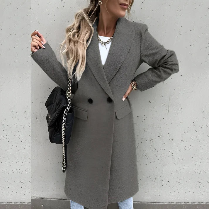Model wearing Rocel Jacket – loose fit polyester women’s winter jacket in solid minimalist style by Vespera The Label