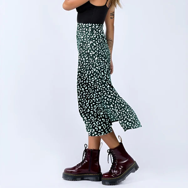Model wearing Lydie Skirt – printed mid-calf A-line cotton skirt, styled for casual warm weather, by Vespera The Label