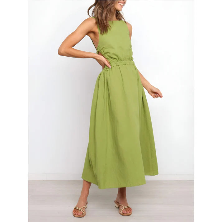 Model wearing Nellie Maxi Dress – relaxed empire waist summer maxi dress with a loose silhouette by Vespera The Label.