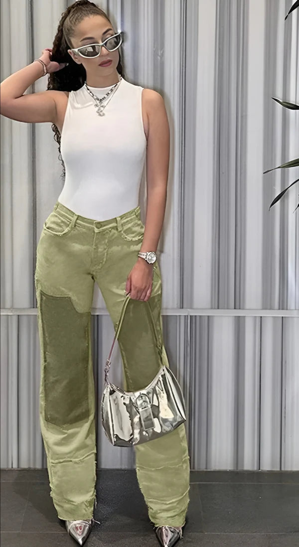 Model wearing Vien Pants – above-the-knee straight-leg mini trousers in solid polyester, by Vespera The Label