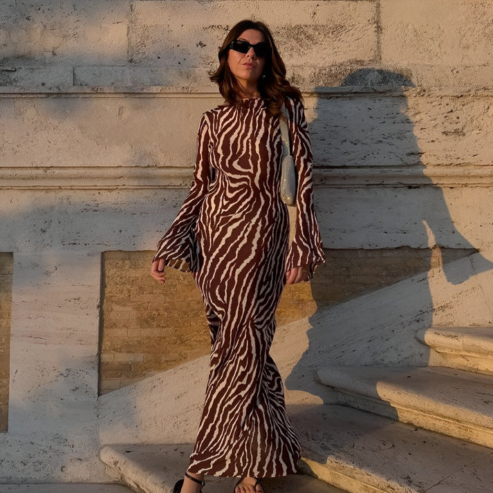 Model wearing Guinne Maxi Dress – straight-cut velvet unisex maxi with plush texture by Vespera The Label.
