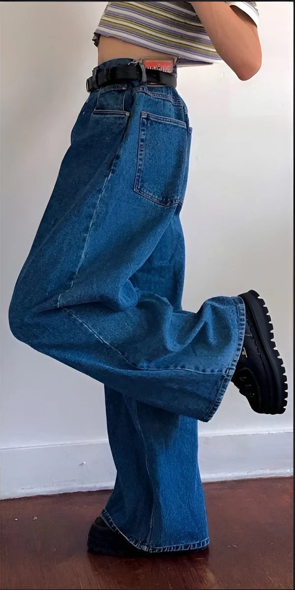 Model wearing Jeaney Pants – high-waisted ankle-length flared trousers with retro silhouette and spliced contrast detail by Vespera The Label