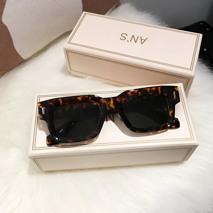 Model wearing Lexie Rectangular Sunglasses – bold cat-eye inspired UV400 fashion sunglasses with plastic frame and acrylic lenses by Vespera The Label