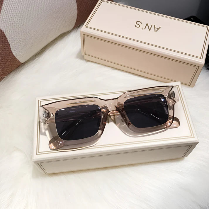 Model wearing Lexie Rectangular Sunglasses – bold cat-eye inspired UV400 fashion sunglasses with plastic frame and acrylic lenses by Vespera The Label