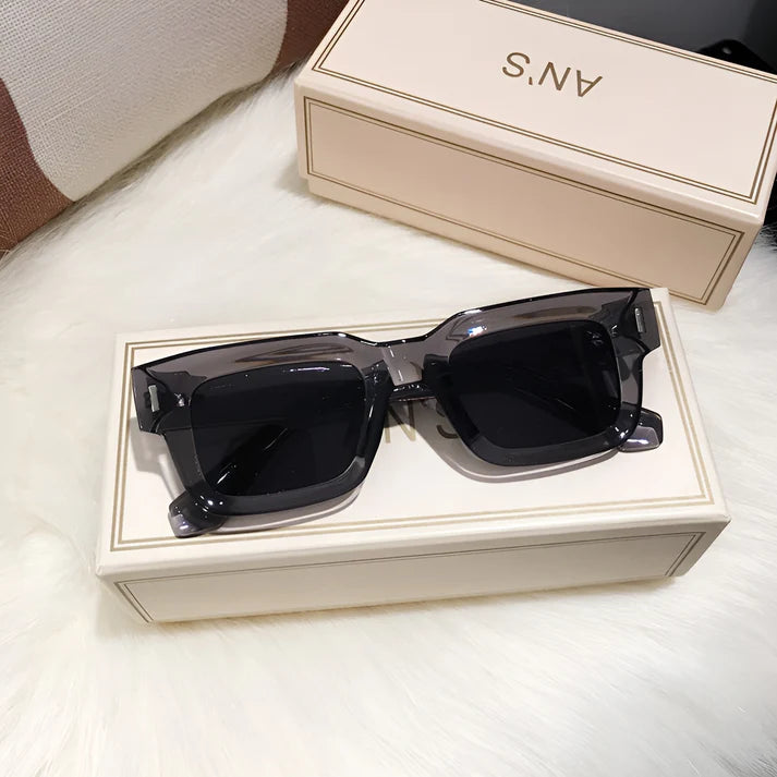 Model wearing Lexie Rectangular Sunglasses – bold cat-eye inspired UV400 fashion sunglasses with plastic frame and acrylic lenses by Vespera The Label