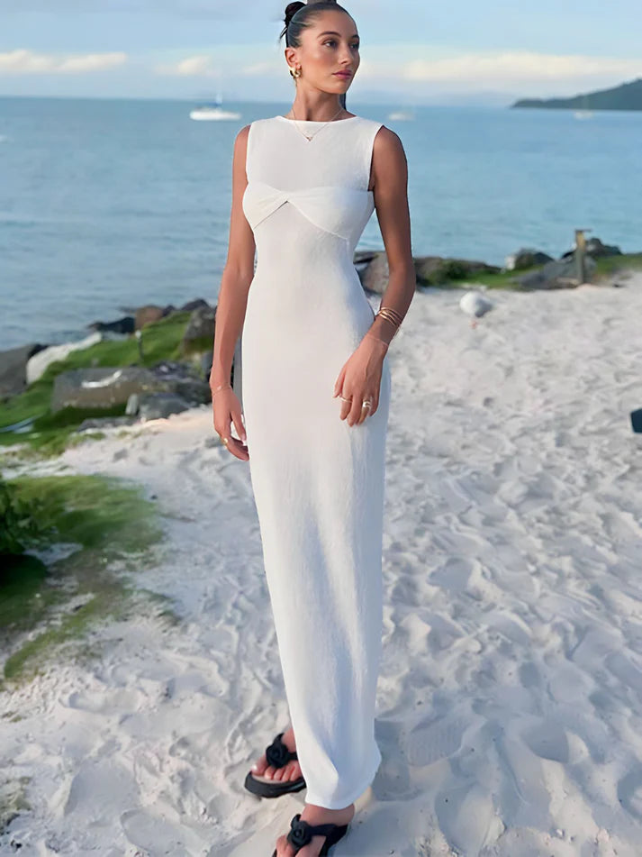 Model wearing Niana Maxi Dress – summer beach-style maxi dress with straight silhouette by Vespera The Label.