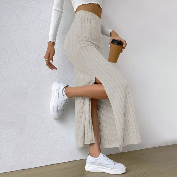 Model wearing Lewis Skirt – straight mid-calf solid skirt, styled for professional wear, by Vespera The Label