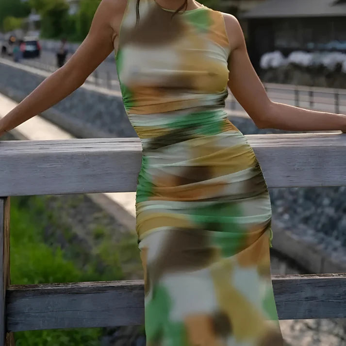Model wearing Patricia Maxi Dress – minimalist full-length maxi dress in elegant solid tone by Vespera The Label.