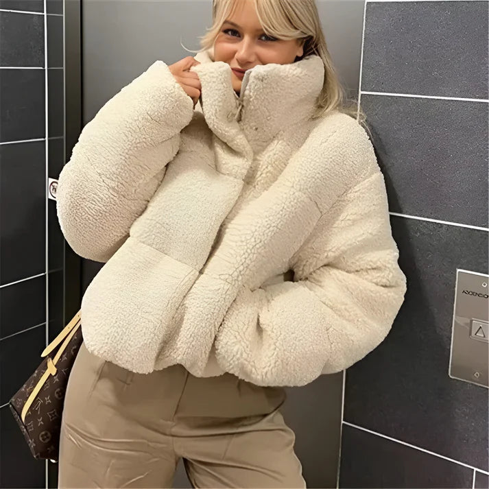 Model wearing Perry Jacket – short wide-waisted women’s winter jacket with stretch and tailored silhouette by Vespera The Label