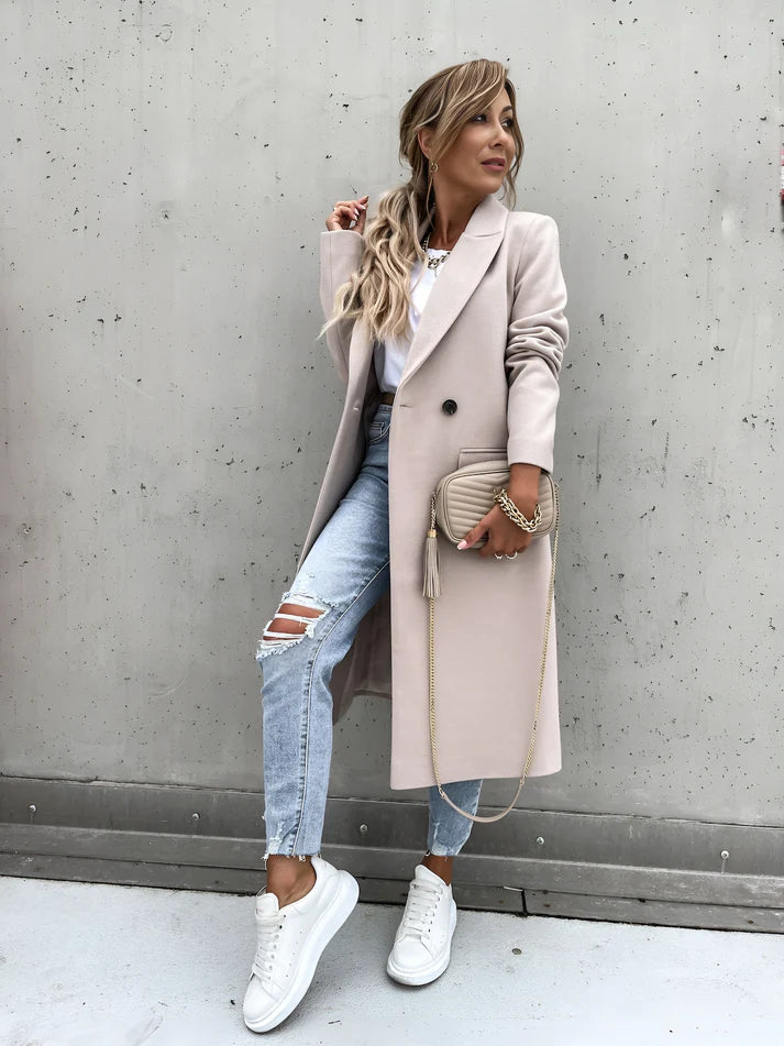 Model wearing Rocel Jacket – loose fit polyester women’s winter jacket in solid minimalist style by Vespera The Label
