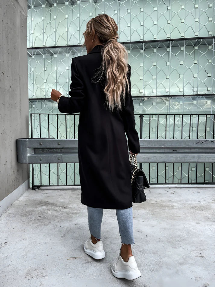 Model wearing Rocel Jacket – loose fit polyester women’s winter jacket in solid minimalist style by Vespera The Label