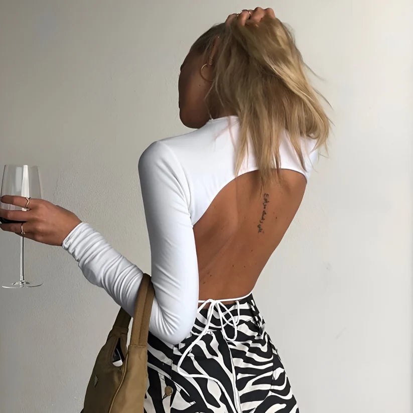 Model wearing Arnim Top – cotton blend crop shirt for women, perfect for layering or pairing with short dresses, by Vespera The Label.