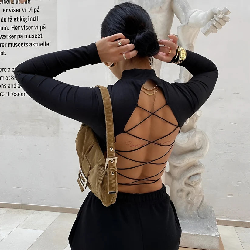 Model wearing Ava Top – cropped streetwear fashion top for women with breathable fabric and slight stretch, from Vespera The Label.