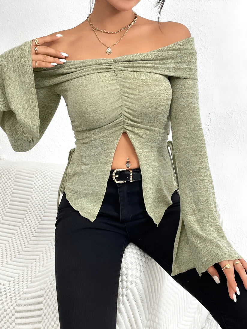 Model wearing Julianna Top – fitted cropped pleated knit top for winter streetwear by Vespera The Label.
