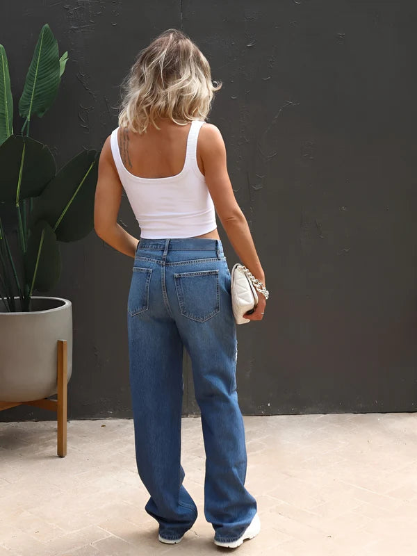 Model wearing Matilda Pants – full-length straight-leg trousers with vintage English style in a mid-rise cut by Vespera The Label