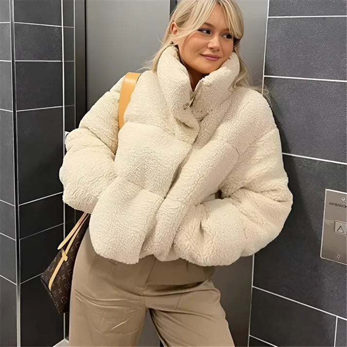 Model wearing Perry Jacket – short wide-waisted women’s winter jacket with stretch and tailored silhouette by Vespera The Label