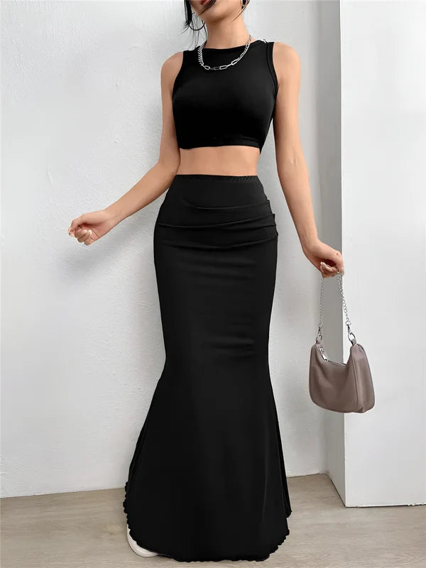 Model wearing Candyce Skirt – floor-length solid mermaid silhouette styled for formal occasions, by Vespera The Label