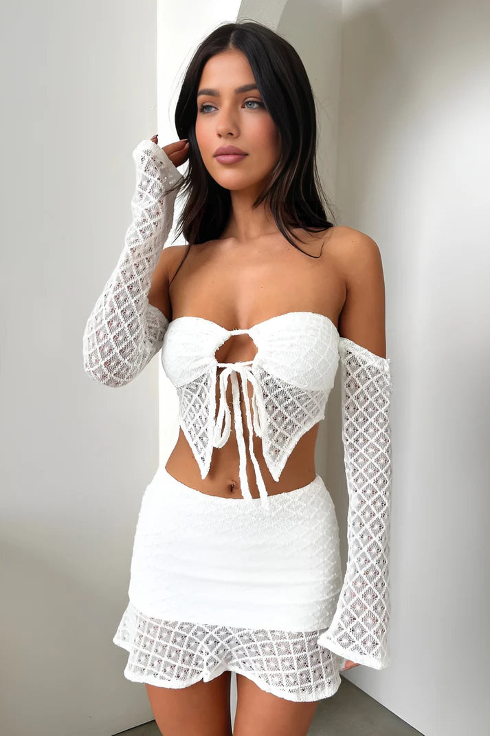 Model wearing Anya Set – fitted crop top and above-knee floral skirt two piece set by Vespera  The Label