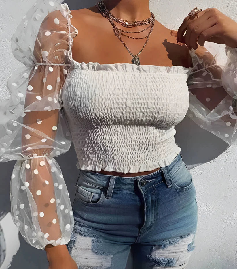 Model wearing Jezriel Top – floral embroidered crop top with hollow-out detail for summer by Vespera The Label.