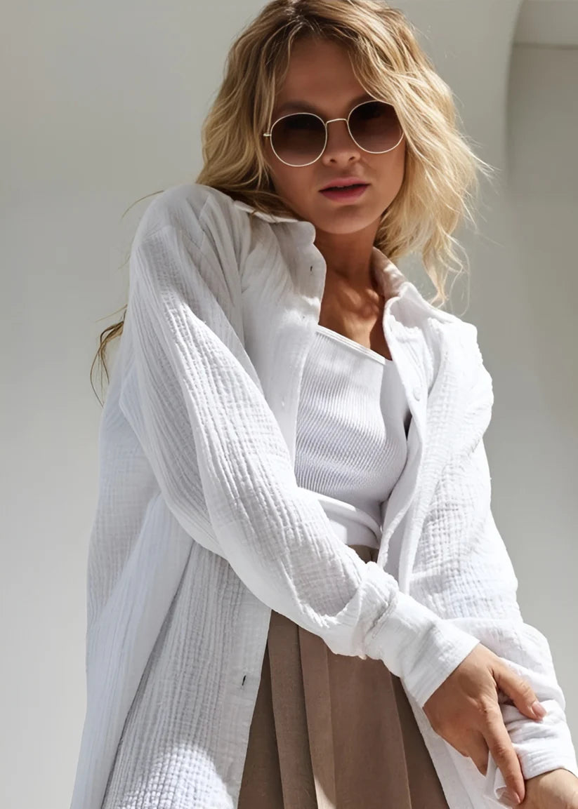 Model wearing Lilia Long Sleeve Top – relaxed cotton long sleeve top in soft natural fabric by Vespera The Label.