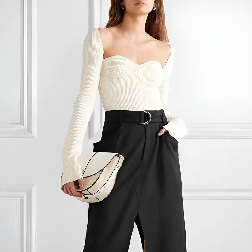 Model wearing Nikki Top – long sleeve cropped streetwear knit top by Vespera The Label.