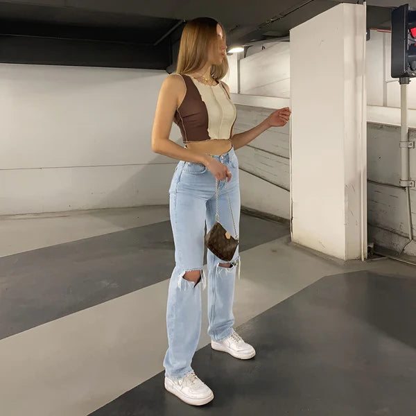 Model wearing Mika Pants – straight-leg ankle trousers with high waist and relaxed fit, by Vespera The Label