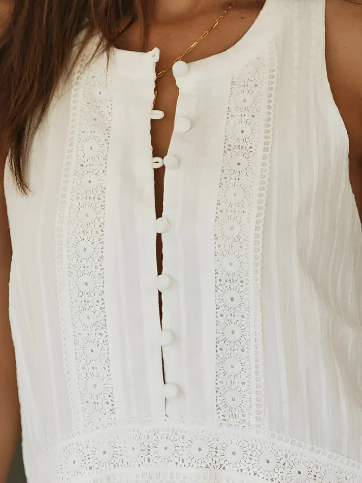 Model wearing Crishna Mini Dress – empire waist A-line mini dress for summer by Vespera The Label.