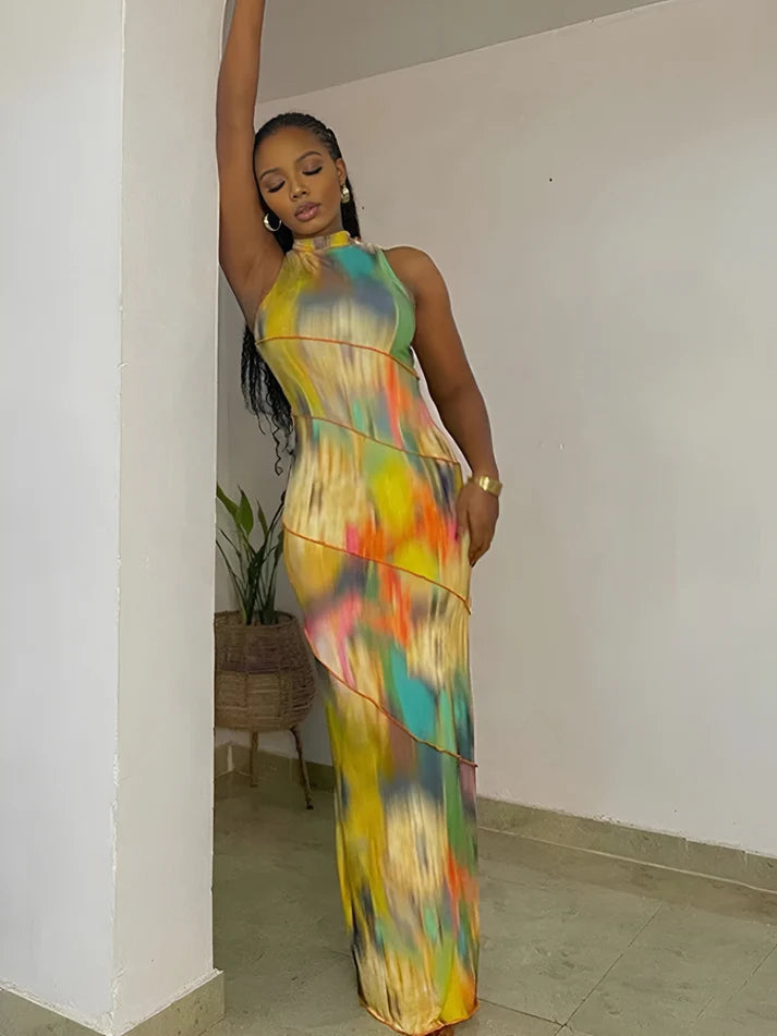 Model wearing Vespera Adrastea Maxi Dress – bold summer patchwork maxi dress with stretch fit by Vespera The Label.