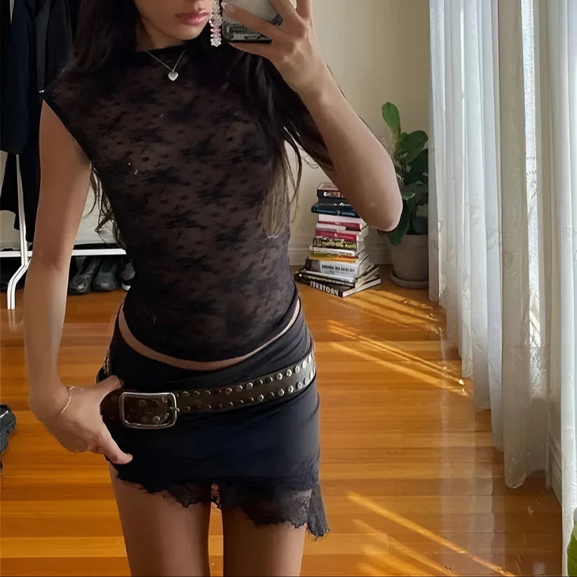 Model wearing Vespera Auralie Top – slim backless mesh crop top for casual or club styling by Vespera The Label.