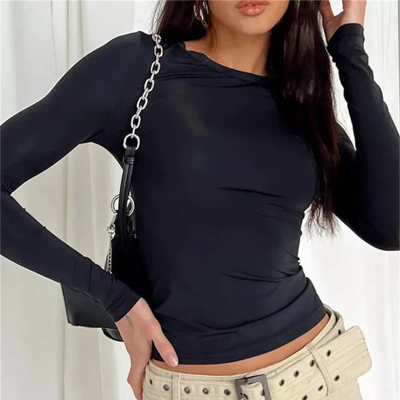 Model wearing Vespera Celestia Long Sleeve Top  – high stretch fitted long sleeve top in sleek, minimalist style by Vespera The Label.