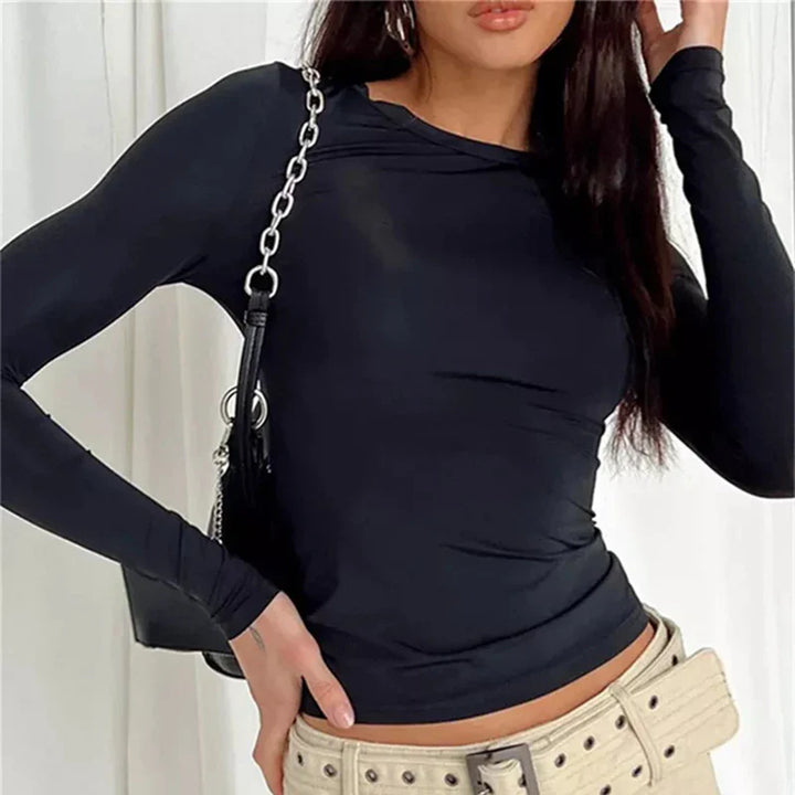 Model wearing Vespera Celestia Long Sleeve Top  – high stretch fitted long sleeve top in sleek, minimalist style by Vespera The Label.